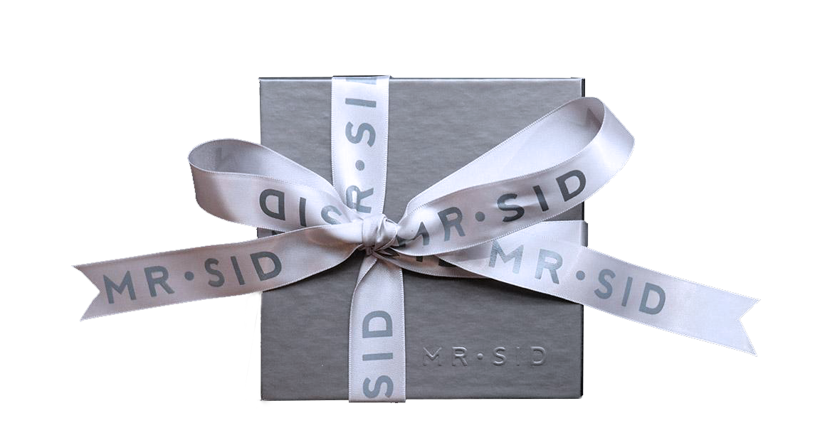 A gift box with a ribbon that says "Mr.Sid"