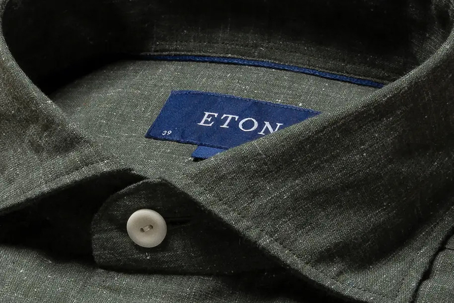 Close up of a gray shirt that says "Eton" by Eton Trunk Show