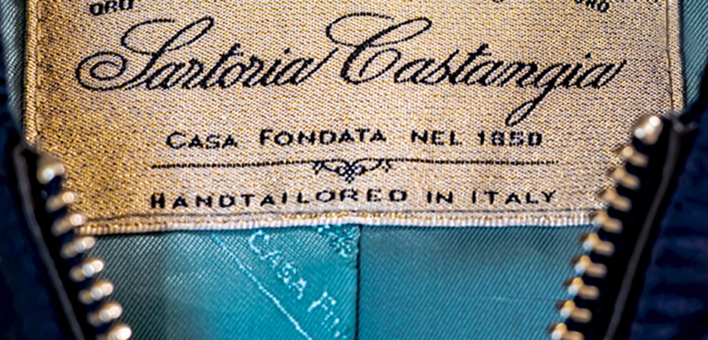 Jacket with the tag that says the brand name and hand tailored in Italy by Castangia